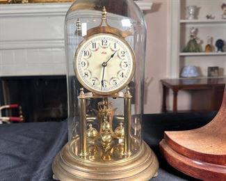 Kundo German enamel faced pendulum clock, some wear to brass, intact but Keininger Obergfell movement needs adjustment 13"H x 7"W