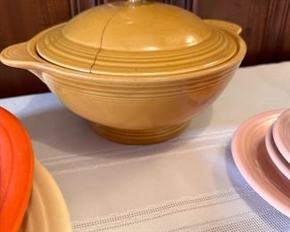 Fiestaware covered casserole 8" mustard color, lid has been repaired