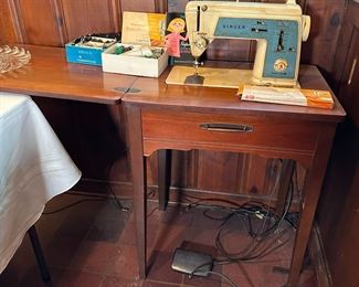 Singer sewing machine, 1967 (working & quiet, does have a crack to top) sewing table, and Singer accessories