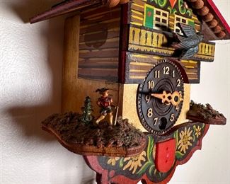 German small cuckoo clock with shield front, cow missing on right, no key, some wear and discoloration 4"H