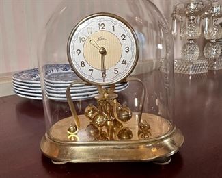 Kern pendulum clock with glass dome, wire needs replaced and repairs may be needed, 7"H x 7"W