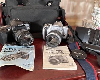 Two Canon rebel cameras and flash