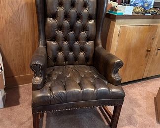 Tufted vinyl wing back chair, some minor tears, some wear, 44"H x 28"W