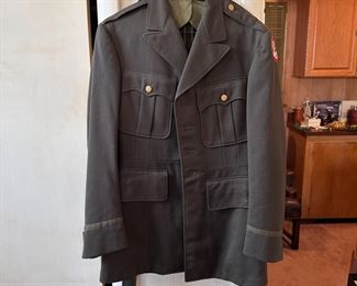 Long Army coat with  Western Pacific shoulder patch, size S/M