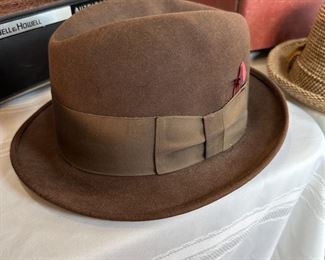 Knox hat with brown band and red/pink feather