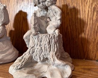 Austin Productions, Alice Heath of boy and girl sitting on a stump 10"H