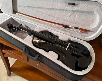 Violin with black sparkle finish, unmarked, needs re-strung, bow shows some wear, with case