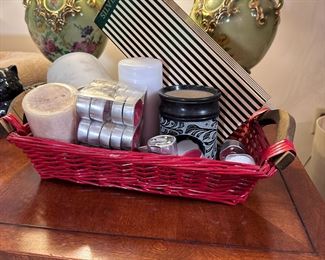 Group of candles in red basket