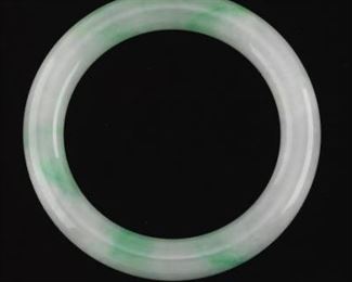 A Green Jadeite Bangle 