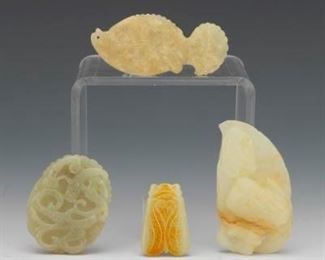 A Group of Four Jade Ornaments 