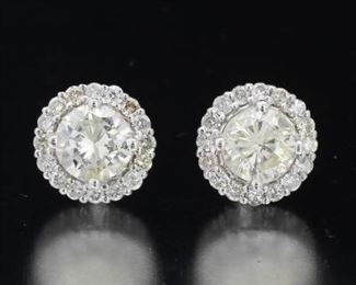 A Pair of 1.03 Carat Diamond Cluster Earrings