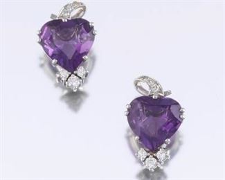 A Pair of Amethyst and Diamond Earrings 