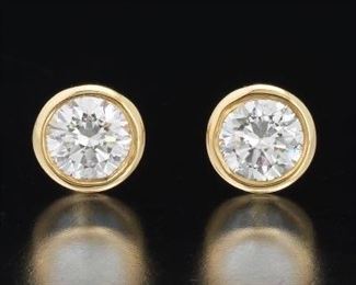 A Pair of Diamond Stud Earrings 
