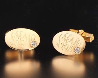 A Pair of Gold and Diamond Cufflinks 