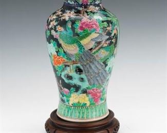 Chinese Famille Noir Vase on Carved Wood Stand