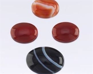 Four Unmounted 38.85 Carat Oval Cabochon Cut Carnelian and Agate Gems 