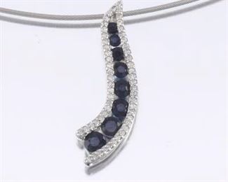 Ladies Gold and Blue Sapphire Slider on Gold Cord 