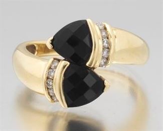 Ladies Gold, Black Onyx and Diamond Bypass Ring 