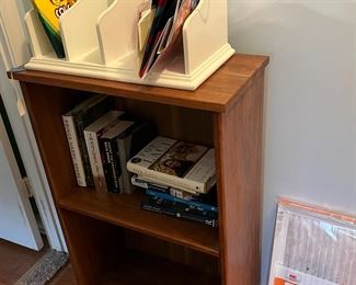 Bookcase, books, and other stuff.