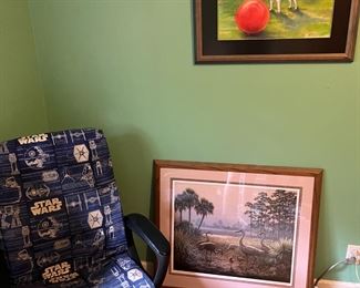 Office chair and framed art.