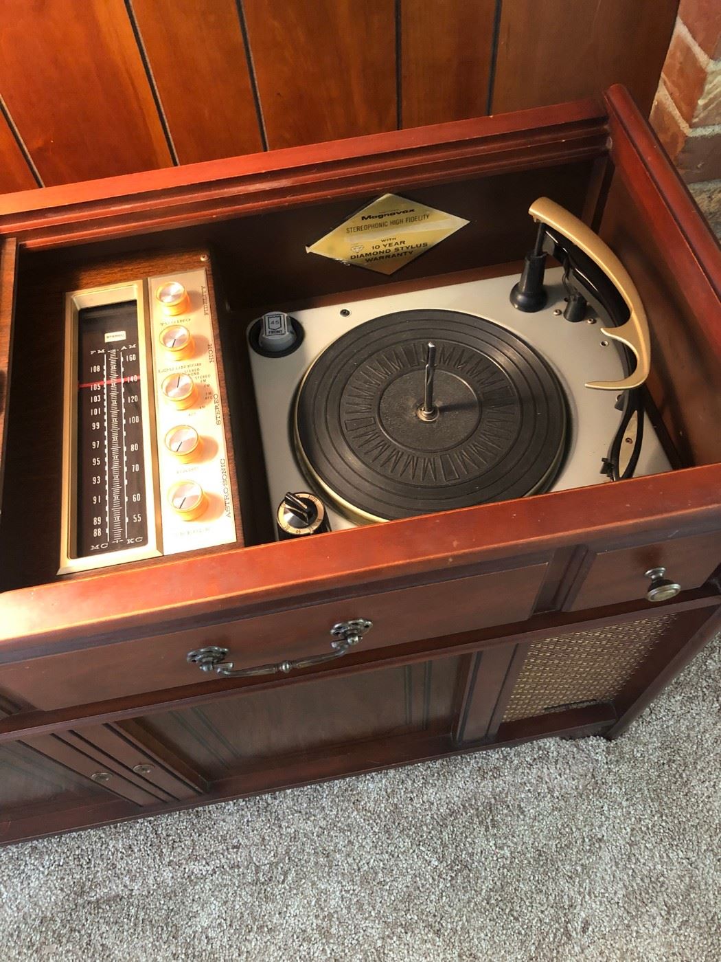 '60s Magnavox high fidelity stereo - turntable, radio tuner, built-in speakers, and record album storage. 