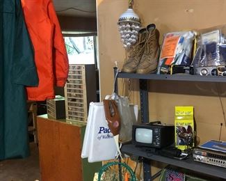 Clam digging nets and 'clam gun'. Fishing tackle box. Survival water packs. Pocket knives. Lamp. CP Radio.