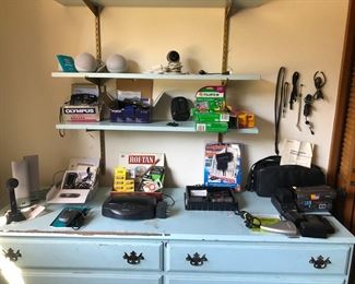 Blue chest. Various tech gadgets.