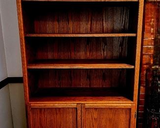 Solid Oak Lighted Bookcase Wall Unit $165 or bid #16 
(hand crafted by our client's dad!)