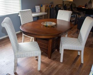 Dining table(includes leaf) and plush chairs (x4)