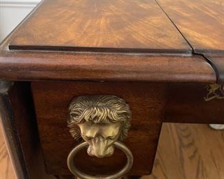 How beautiful is this dropleaf table? I believe it is a mahogany flame veneer but not 100 percent sure. It is beautiful and versatile. Can be kept closed for storage or open for guests.  Classic lines.  It is marked Hamilton Alexander and is one of their older pieces.  