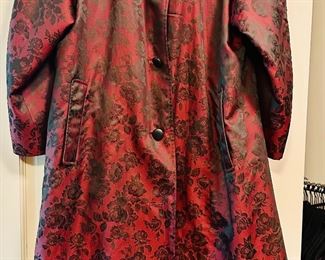 Aquascutum printed swing raincoat.