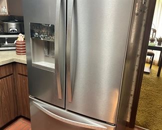 Nice size refrigerator by Whirlpool. 