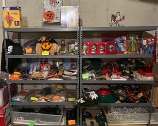 Lower Level-Sports Room:  Halloween and Christmas items are displayed on two separately priced shelf racks.  There are probably 30 Halloween costumes, many still in their original bags, as well as Christmas wreaths and lots of lights (white and multi-color).  Each shelf rack measures 48" wide x 24" deep x 72" tall.