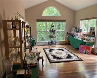Sun Room:  Various decorative items, kitchen wares, rug, and etagere are displayed in this area off of the kitchen.  Closer photos follow.