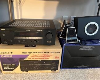 Lower Level:  Displayed under the double tower pier group is another YAMAHA RX-V765 AV receiver with original box and an ALTEC LANSING subwoofer and pair of speakers.