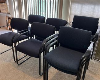 Lower Level:  There are multiple sets of office chairs.  Shown are one set of four; one set of three; and one set of four.  Some are by STEELCASE.