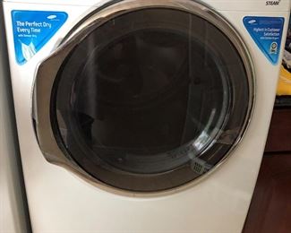 Laundry Room-On Way to the Garage:  This is a front view of the SAMSUNG Steam dryer (electric, 220).