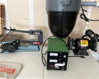 Garage:  Shown are a DELTA 16" scroll saw; a BIO-RAD Model 500/200 power supply; and a Collins-Quality 6" Bench Grinder with 1/2 horsepower.