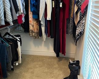 Master Bedroom-First Floor:  Women's clothes includes some evening dresses and casual wear,  mostly small (8-10) sizes.  Also nearby are shoes and boots (sizes 8 and 8-1/2).