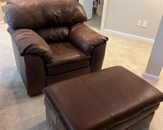Lower Level:  The oversize leather chair is priced separately from the ottoman on casters.