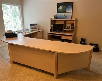 Office Area-Second Floor:  A four piece (made in Denmark) modular desk unit is priced separately from its coordinating three-drawer file cabinet.  The desk pieces measure:   from left to right 59" wide; curved at 64"; 59" wide; and curved at 47."  Also shown is a light wood computer desk with two upper shelves and a pull-out keyboard.  Nearby but now shown is also a light wood (Denmark) bookcase.    Closer photos of the other items follow.