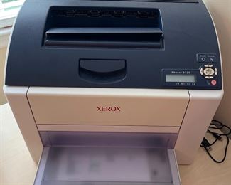 Office Area-Upstairs:  This is a high quality XEROX Phaser 6120 laser color printer. 