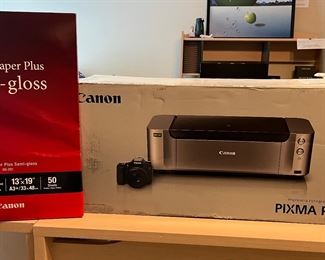 Office Area-Upstairs:  New and still-in-the box is this   CANON PIXMA Pro-100 Digital Wireless Inkjet printer which is priced separately from the CANON photo paper on the left.