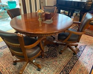 53” diameter round kitchen table with 4 adjustable armchairs