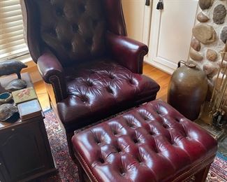Tufted leather wing chair and ottoman