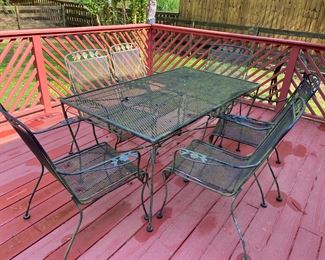 wrought iron mesh patio table and 6 chairs