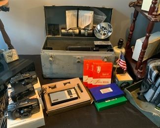 Various vintage cameras, AM FM radio