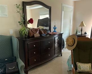 Mirrored cherry dresser, wingback chair