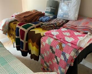 Vintage quilts, crochet throws, bed linens