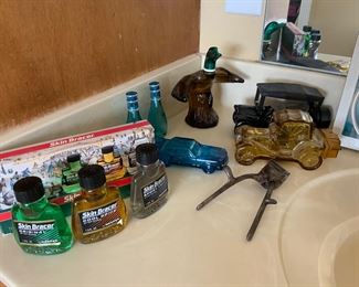 Vintage Antique car and duck bottles, 